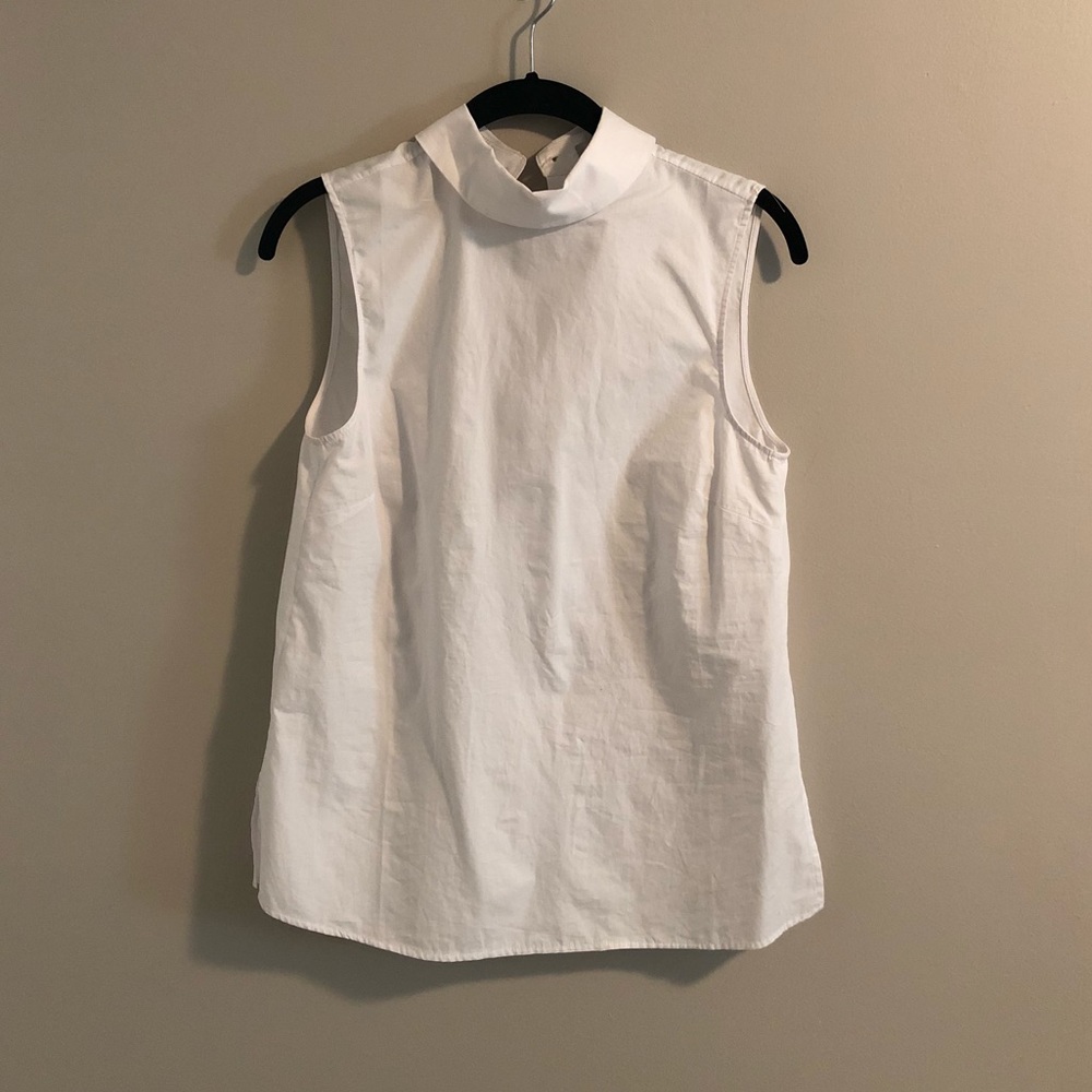 White Turtleneck Sleeveless Blouse